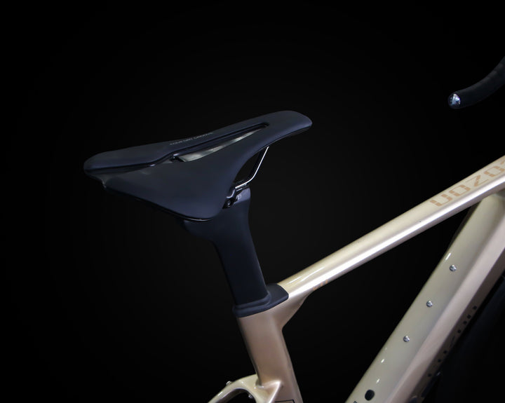 COZON Carbon C11 Electric Road Bike in sleek silver, featuring advanced performance, lightweight carbon frame, hydraulic Shimano brakes, and smooth electric shifting. Perfect for road cycling enthusiasts seeking comfort, speed, and reliability. Stylish silver design, ergonomic saddle, aerodynamic handlebars, high-capacity battery, and cutting-edge electric motor make it ideal for long rides and urban commuting.